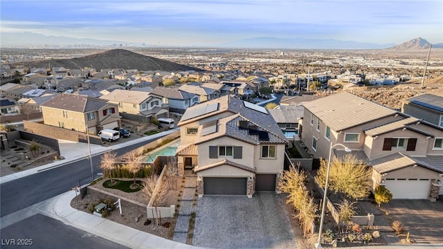 aerial view featuring a mountain view and a residential view