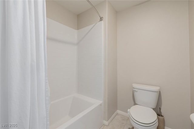 bathroom with tile patterned flooring, shower / bath combination with curtain, toilet, and baseboards