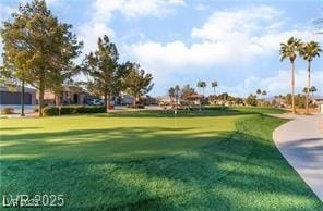 3609 Citrus Heights Ave, North Las Vegas, NV 89081 - view of property's community with golf course view and a yard