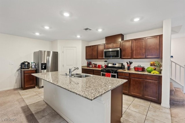 2945 Torreon Ln, Las Vegas, NV 89121 - kitchen with a sink, stainless steel appliances, light stone counters, and recessed lighting