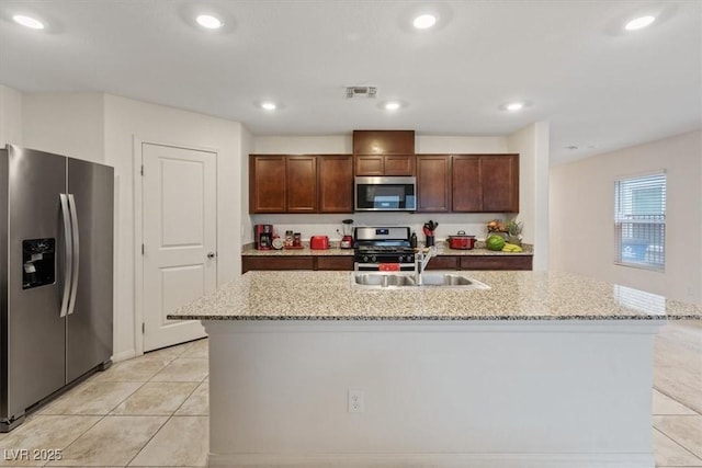 2945 Torreon Ln, Las Vegas, NV 89121 - kitchen featuring visible vents, a sink, recessed lighting, appliances with stainless steel finishes, and light tile patterned flooring