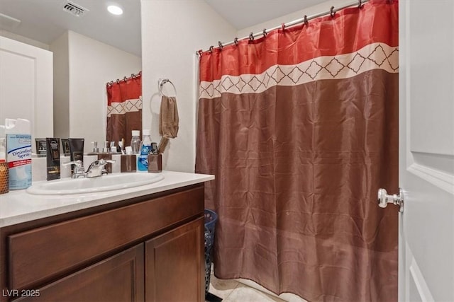 2945 Torreon Ln, Las Vegas, NV 89121 - bathroom with visible vents, a shower with curtain, and vanity