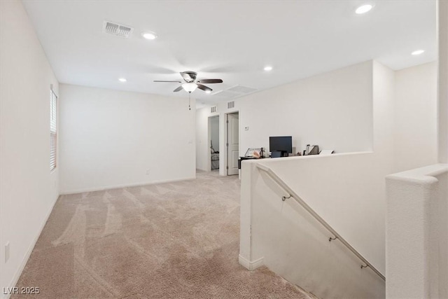 2945 Torreon Ln, Las Vegas, NV 89121 - hallway with recessed lighting, visible vents, an upstairs landing, and light colored carpet