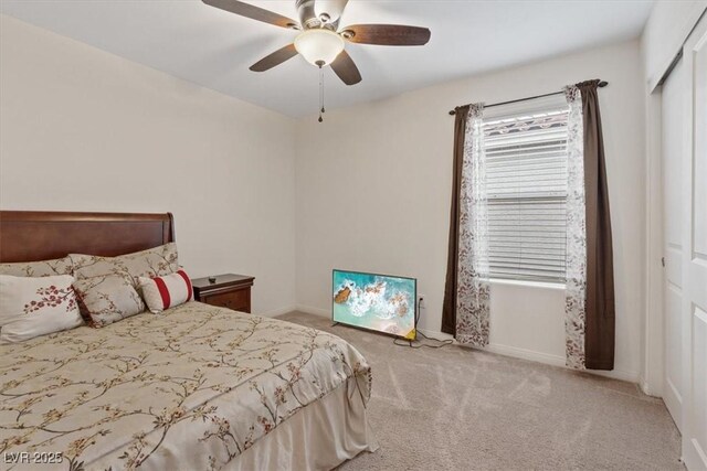2945 Torreon Ln, Las Vegas, NV 89121 - bedroom featuring a closet, baseboards, a ceiling fan, and carpet floors