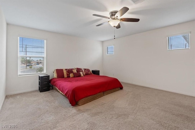 2945 Torreon Ln, Las Vegas, NV 89121 - bedroom with ceiling fan, baseboards, and carpet floors