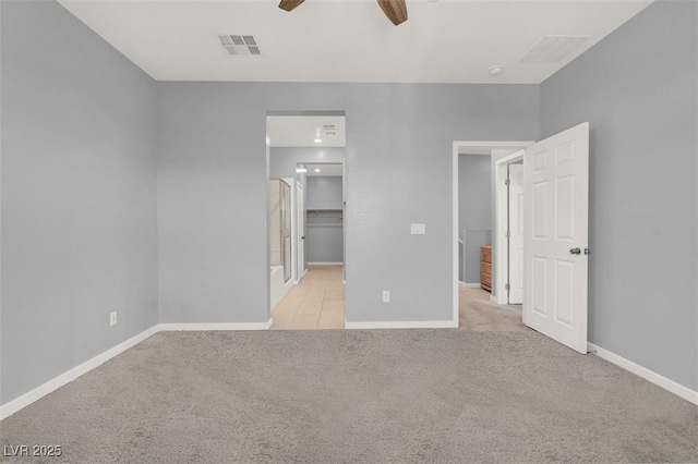 965 Nevada State Dr Unit 36102, Henderson, NV 89002 - unfurnished bedroom with baseboards, visible vents, a ceiling fan, and light colored carpet
