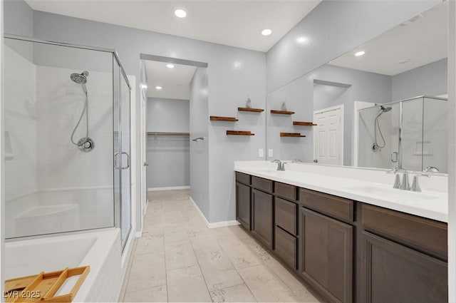 965 Nevada State Dr Unit 36102, Henderson, NV 89002 - full bathroom featuring a stall shower, double vanity, and a sink