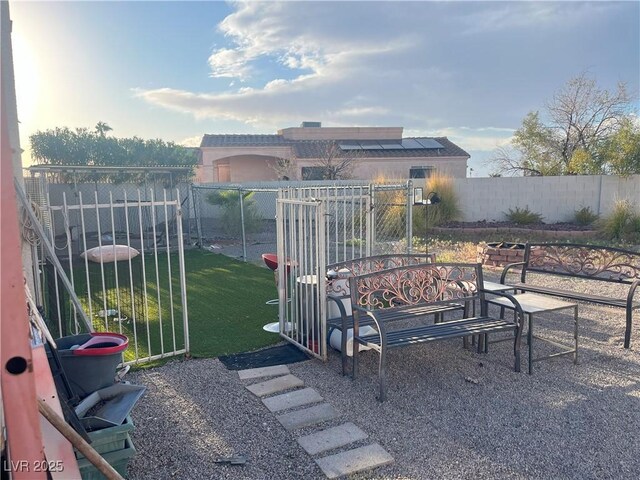 441 Daylin Ct, Henderson, NV 89015 - view of yard featuring outdoor dining area, a fenced backyard, and a patio area