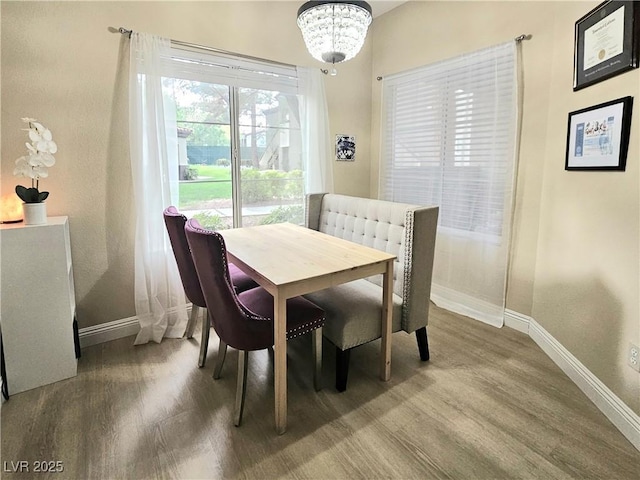 9000 S Las Vegas Blvd Unit 1187, Las Vegas, NV 89123 - dining area with baseboards, wood finished floors, and a chandelier