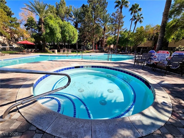 9000 S Las Vegas Blvd Unit 1187, Las Vegas, NV 89123 - community pool featuring a community hot tub and a patio