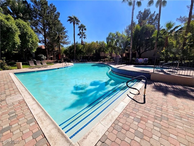 9000 S Las Vegas Blvd Unit 1187, Las Vegas, NV 89123 - community pool featuring a patio and view of scattered trees