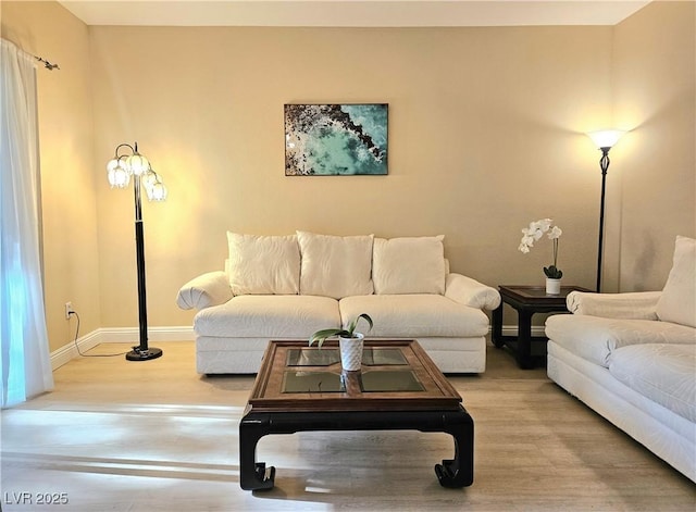 9000 S Las Vegas Blvd Unit 1187, Las Vegas, NV 89123 - living room featuring baseboards and wood finished floors
