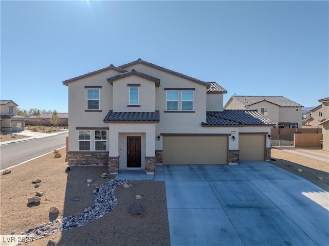 3981 E Teller Dr, Pahrump, NV 89061 - view of front facade with stone siding, stucco siding, a tiled roof, and driveway