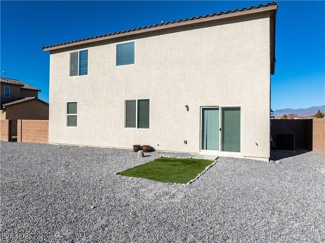 3981 E Teller Dr, Pahrump, NV 89061 - back of house featuring a fenced backyard, a patio, stucco siding, and central AC unit