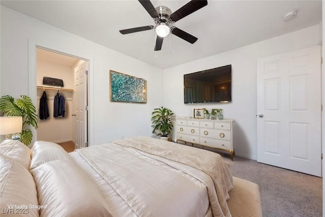 3981 E Teller Dr, Pahrump, NV 89061 - carpeted bedroom with a ceiling fan and a walk in closet