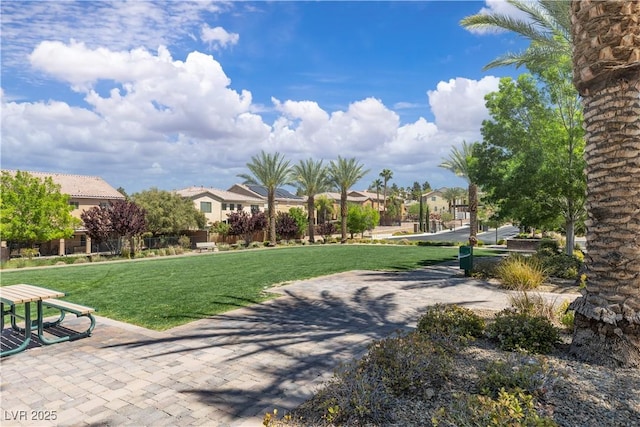 2833 Athena Hill Ct, Henderson, NV 89052 - surrounding community with a lawn and a residential view