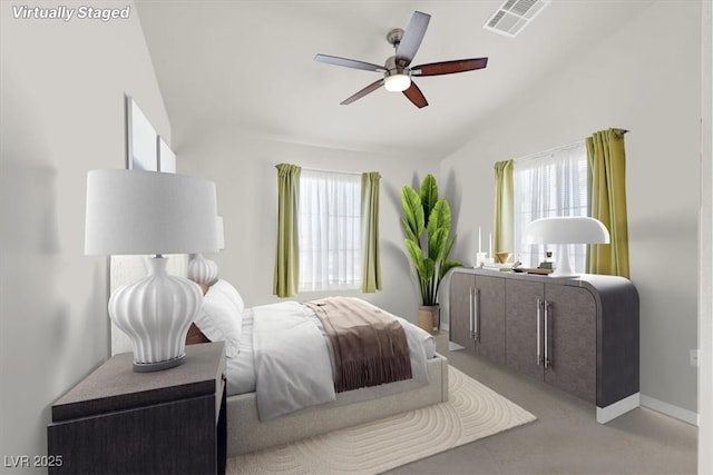 8426 Sluman Ct, Las Vegas, NV 89128 - bedroom with multiple windows, vaulted ceiling, ceiling fan, and baseboards