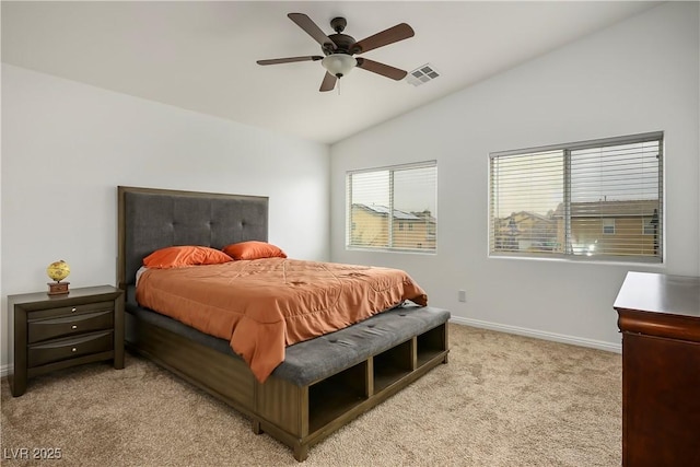 bedroom featuring visible vents, ceiling fan, baseboards, vaulted ceiling, and light carpet