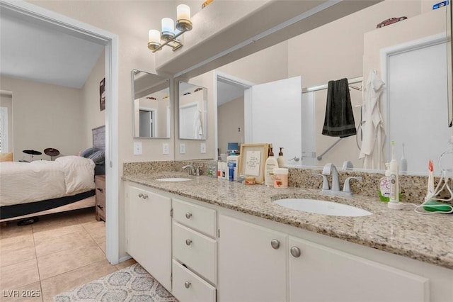 5000 Red Rock St Unit 241, Las Vegas, NV 89118 - full bath with ensuite bath, tile patterned floors, and double vanity