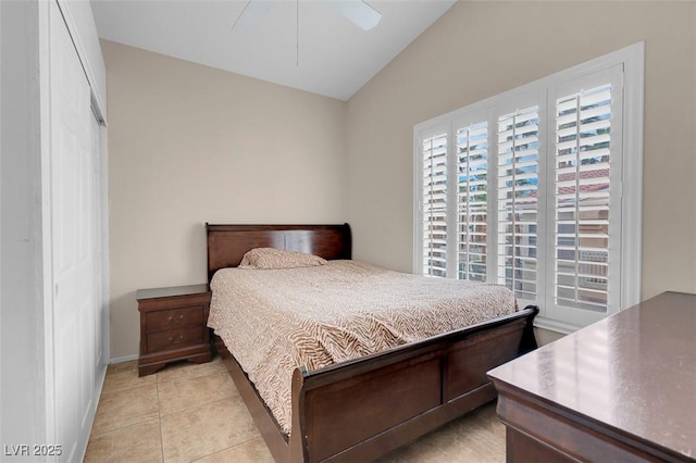 5000 Red Rock St Unit 241, Las Vegas, NV 89118 - bedroom featuring vaulted ceiling, a closet, baseboards, ceiling fan, and light tile patterned flooring