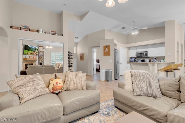 5000 Red Rock St Unit 241, Las Vegas, NV 89118 - living area with a ceiling fan, high vaulted ceiling, and light tile patterned floors
