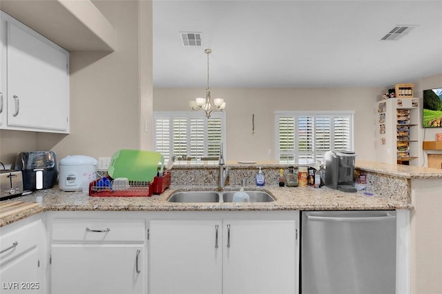 5000 Red Rock St Unit 241, Las Vegas, NV 89118 - kitchen featuring dishwasher, a sink, white cabinetry, and a chandelier