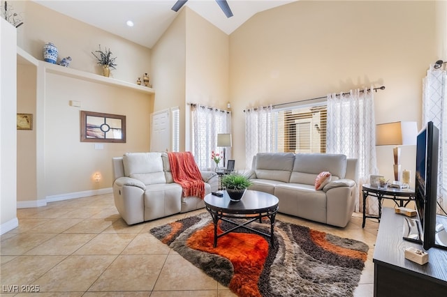 2246 Cassatt Dr, Henderson, NV 89074 - tiled living area with baseboards, high vaulted ceiling, and a ceiling fan