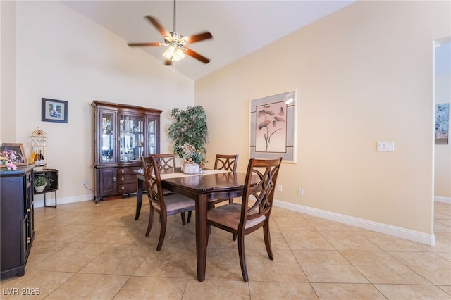 2246 Cassatt Dr, Henderson, NV 89074 - dining area with light tile patterned floors, baseboards, and a ceiling fan