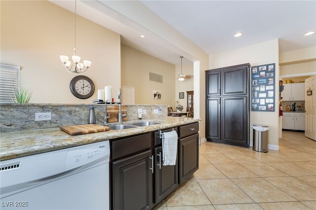 2246 Cassatt Dr, Henderson, NV 89074 - kitchen featuring dishwasher, pendant lighting, light tile patterned floors, and a sink