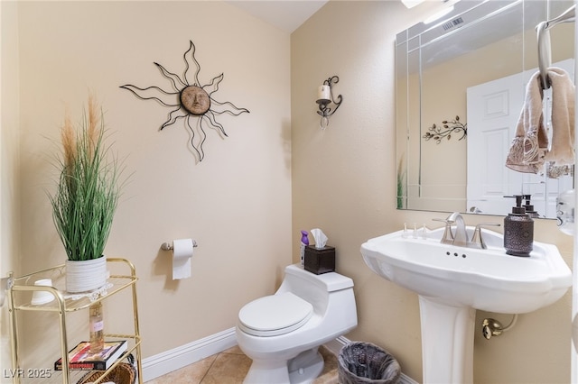 2246 Cassatt Dr, Henderson, NV 89074 - half bathroom with visible vents, baseboards, toilet, and tile patterned flooring
