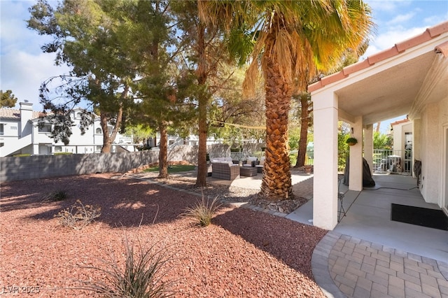 2246 Cassatt Dr, Henderson, NV 89074 - view of yard with outdoor lounge area, a patio, and fence
