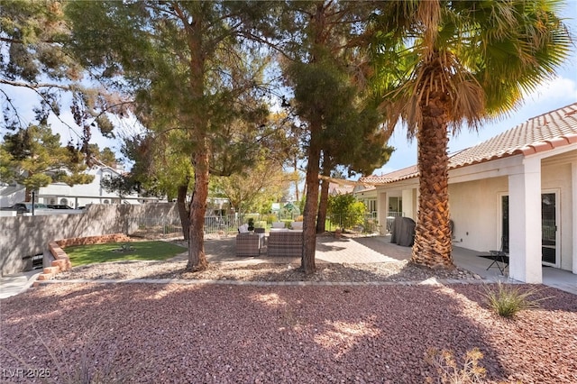 2246 Cassatt Dr, Henderson, NV 89074 - view of yard with outdoor lounge area, a patio, and fence