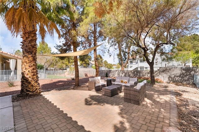 2246 Cassatt Dr, Henderson, NV 89074 - view of patio / terrace with an outdoor living space and a fenced backyard