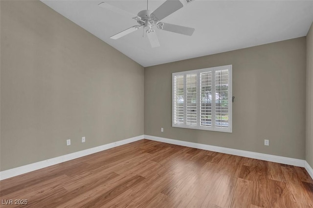 8217 Ashkum Ave, Las Vegas, NV 89149 - empty room featuring baseboards, light wood-type flooring, vaulted ceiling, and ceiling fan