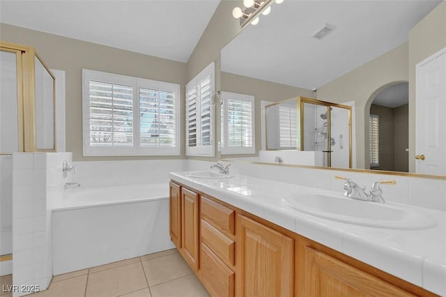 8217 Ashkum Ave, Las Vegas, NV 89149 - bathroom with a stall shower, a bath, double vanity, and tile patterned flooring