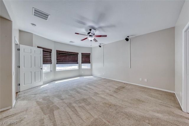2528 Flodden St, Henderson, NV 89044 - spare room featuring visible vents, ceiling fan, carpet flooring, and baseboards