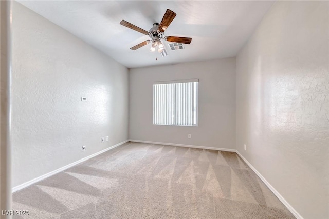 2528 Flodden St, Henderson, NV 89044 - spare room featuring carpet floors, baseboards, a ceiling fan, and visible vents