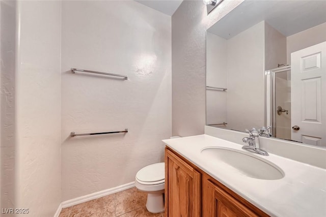 2528 Flodden St, Henderson, NV 89044 - full bath with vanity, an enclosed shower, baseboards, and toilet