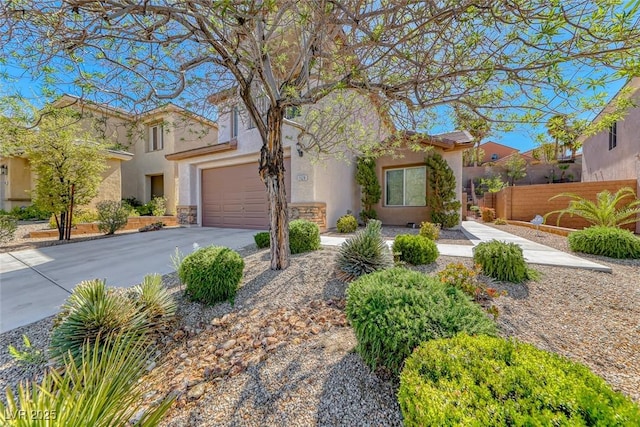 2528 Flodden St, Henderson, NV 89044 - view of front of property featuring fence, stone siding, driveway, and stucco siding
