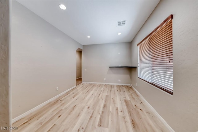 2528 Flodden St, Henderson, NV 89044 - unfurnished room featuring visible vents, baseboards, recessed lighting, and wood finished floors