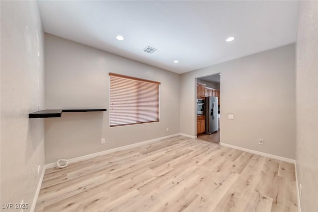 2528 Flodden St, Henderson, NV 89044 - unfurnished room featuring light wood finished floors, baseboards, and recessed lighting