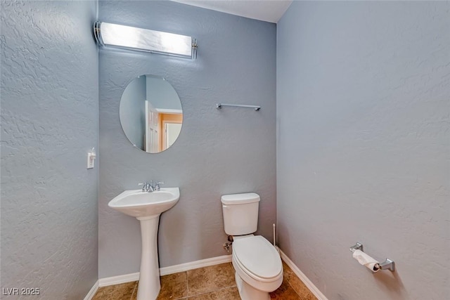 2528 Flodden St, Henderson, NV 89044 - bathroom featuring toilet and tile patterned floors