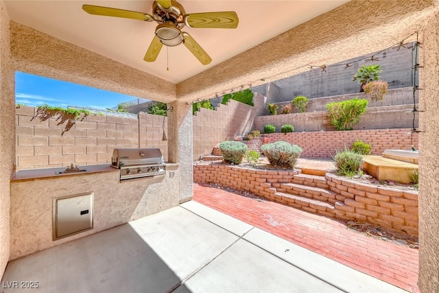 2528 Flodden St, Henderson, NV 89044 - view of patio / terrace with a fenced backyard, a ceiling fan, and area for grilling