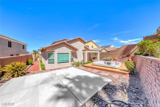 2528 Flodden St, Henderson, NV 89044 - mediterranean / spanish-style house with a fenced backyard, a tile roof, a patio, and stucco siding