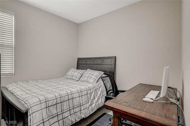 bedroom featuring carpet