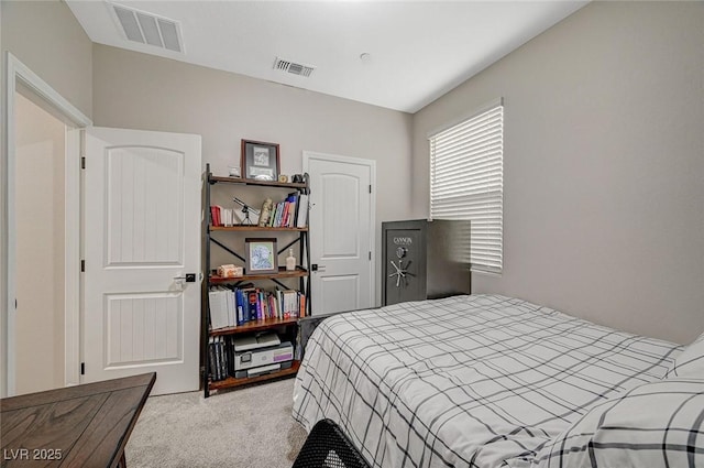bedroom featuring visible vents and carpet flooring