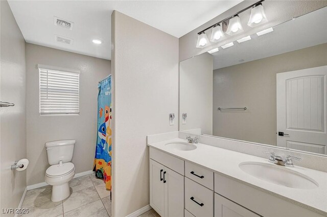 full bathroom with a sink, visible vents, toilet, and tile patterned floors