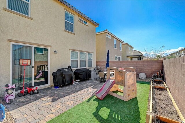 exterior space featuring a patio and a fenced backyard