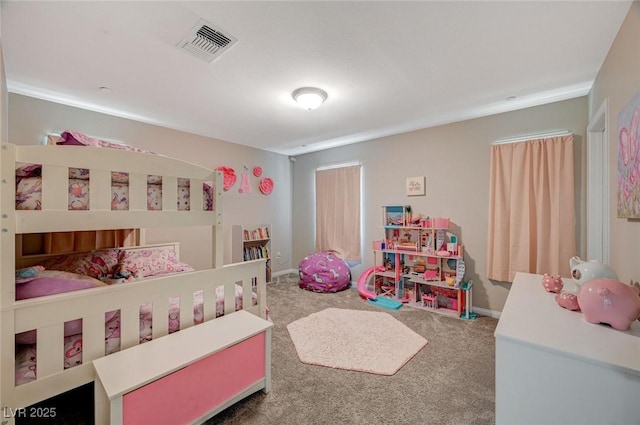 bedroom with visible vents, baseboards, and carpet flooring