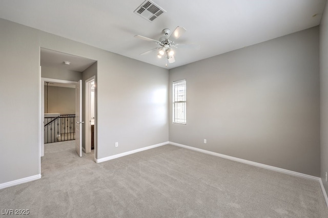 unfurnished bedroom featuring carpet flooring, baseboards, and a ceiling fan